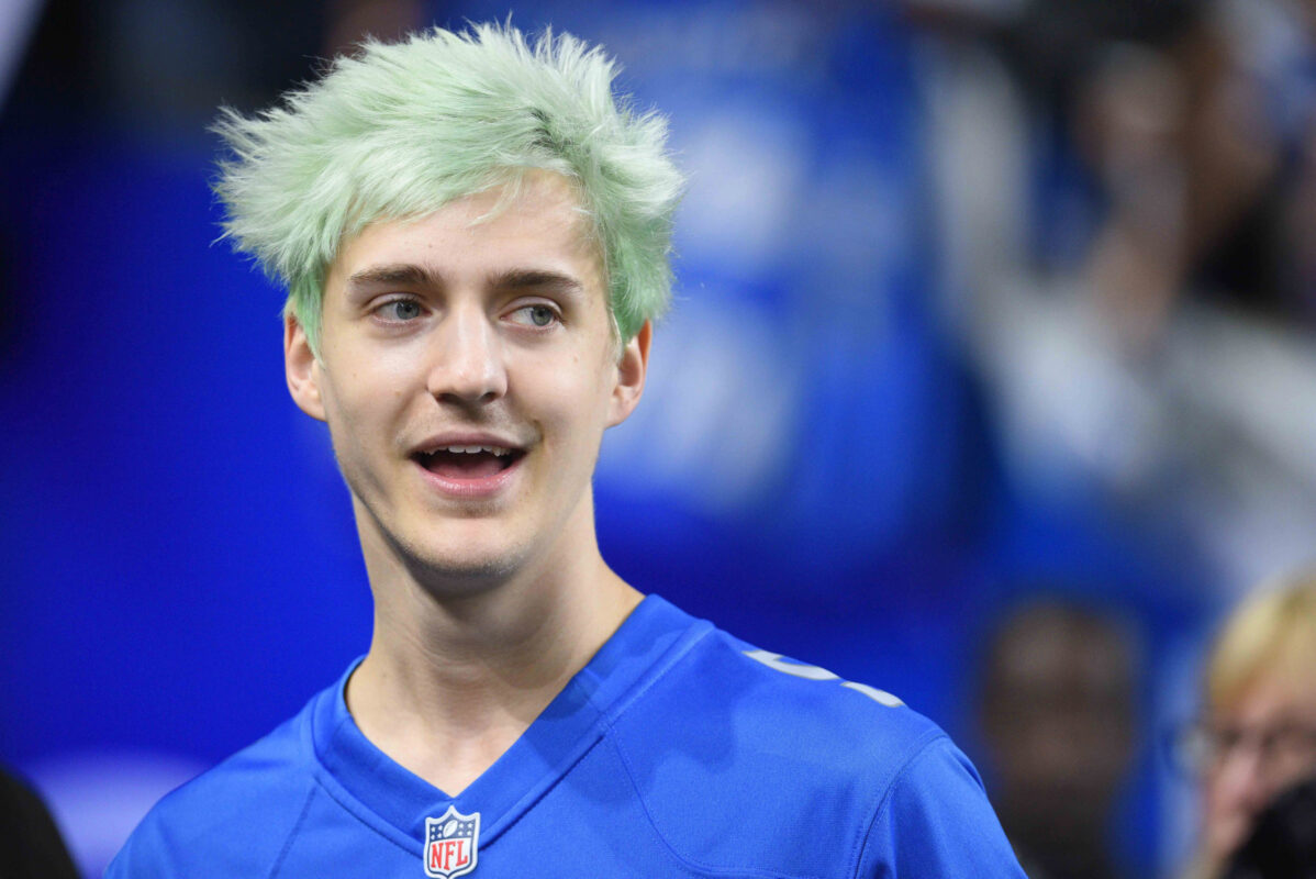 If **Ninja**, the popular streamer and content creator, got a low taper fade haircut, it would definitely give him a fresh, clean, and more classic look! A **low taper fade** is a haircut where the hair gradually shortens as it moves down the sides and back of the head, starting lower on the scalp. It creates a subtle fade effect, giving a neat, structured appearance without being too bold. Here's what might happen or how it could affect his overall look: ### 1. **More Classic and Understated**: Ninja is known for his bold, bright blue hair and edgy, distinctive style. A low taper fade would tone down his usual look while still keeping it modern. It would provide a sharp, clean cut that could complement his face shape and features, while offering something a little more refined compared to his usual styles. ### 2. **A Cool, Professional Vibe**: Given Ninja’s high profile in the gaming and streaming world, a low taper fade might give him a more polished, professional appearance for certain events or collaborations, like interviews, meetings, or public appearances. It could help him stand out in a more subtle, mature way compared to his loud, vibrant hair. ### 3. **Easy to Maintain**: A low taper fade is relatively low-maintenance compared to some of the more complex haircuts Ninja has had in the past. It doesn't require constant upkeep of longer sections of hair, just a trim to keep the fade looking sharp. It would be practical for someone with a busy schedule like him. ### 4. **Balance with the Bold Blue Hair**: If he still kept his signature **blue hair** but paired it with the low taper fade, it would create a contrast between the clean, structured fade and the boldness of the color. This could be a fun way to keep the vibrant personality Ninja is known for while trying out a more subdued cut. ### 5. **Versatile Looks**: A low taper fade is versatile, so if Ninja ever wanted to switch up his style for a particular stream or event, he could easily style the top part of his hair in a variety of ways — from slicked-back looks to more textured styles — making it adaptable to different moods or occasions. In conclusion, if Ninja got a low taper fade, it would likely bring a balance of style and practicality. It would give him a clean, sharp look while still allowing room for his signature individuality with color and style!